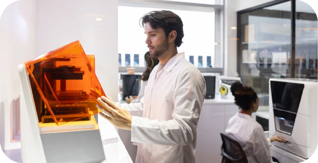 a man in a lab coat works with a scientific instrument for antimicrobial resistance