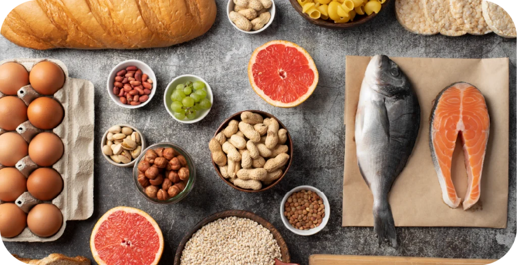 an assortment of common foods that must be subjected to food allergen testing, including eggs, nuts, seafood and gluten-based products placed on a bench