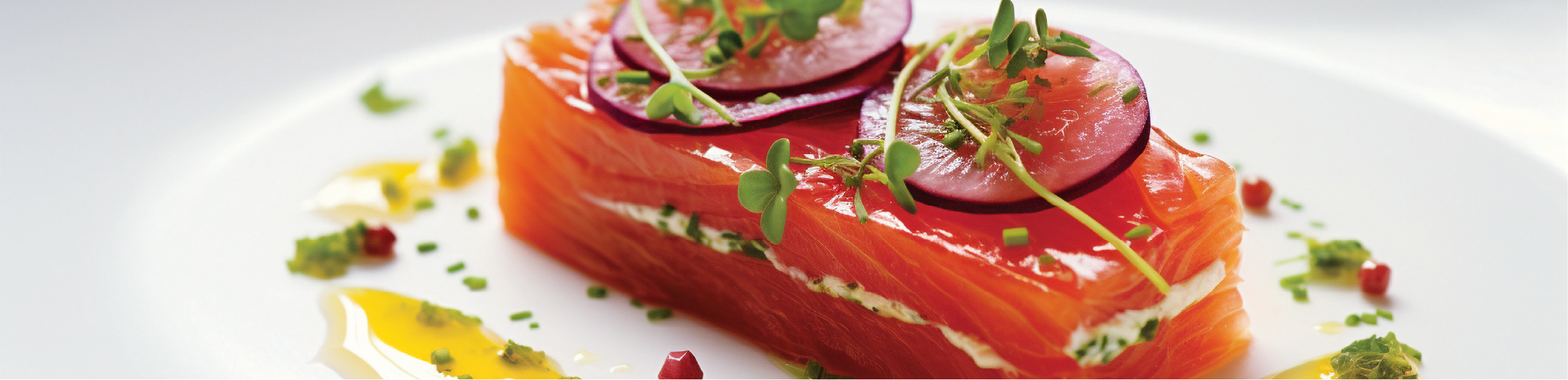 raw salmon with cream cheese and radish plated nicely in a restaurant