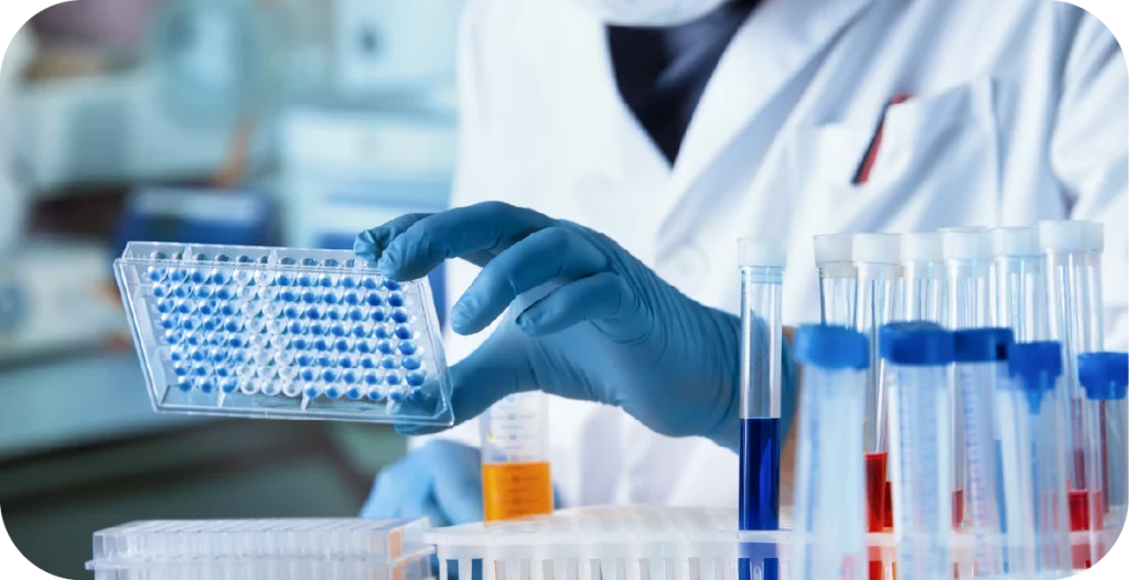 a scientist in a lab with equipment and reagents conducting a sexual health test diagnosis