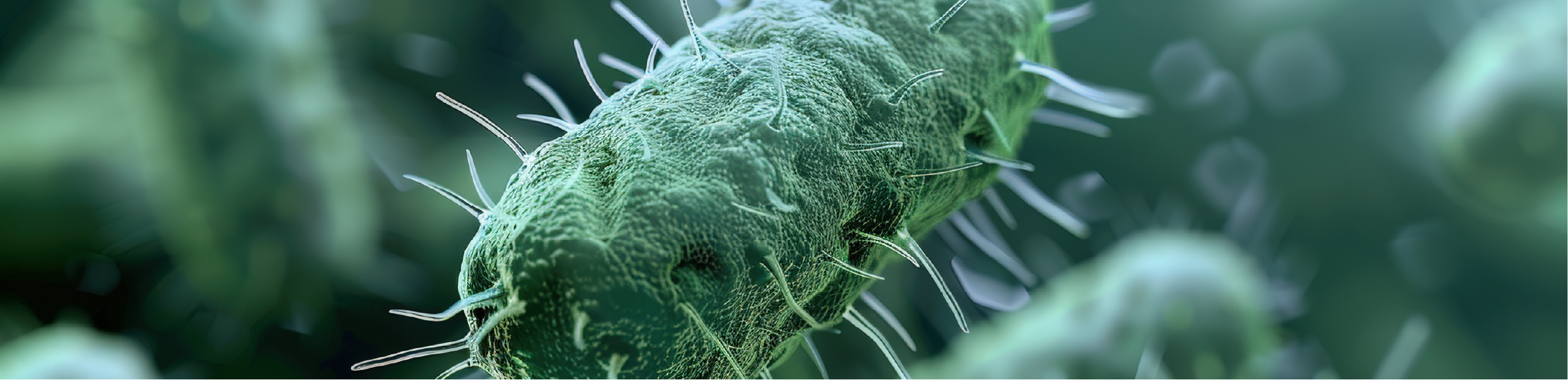 a close up of a green bacterium floating through a dark green liquid