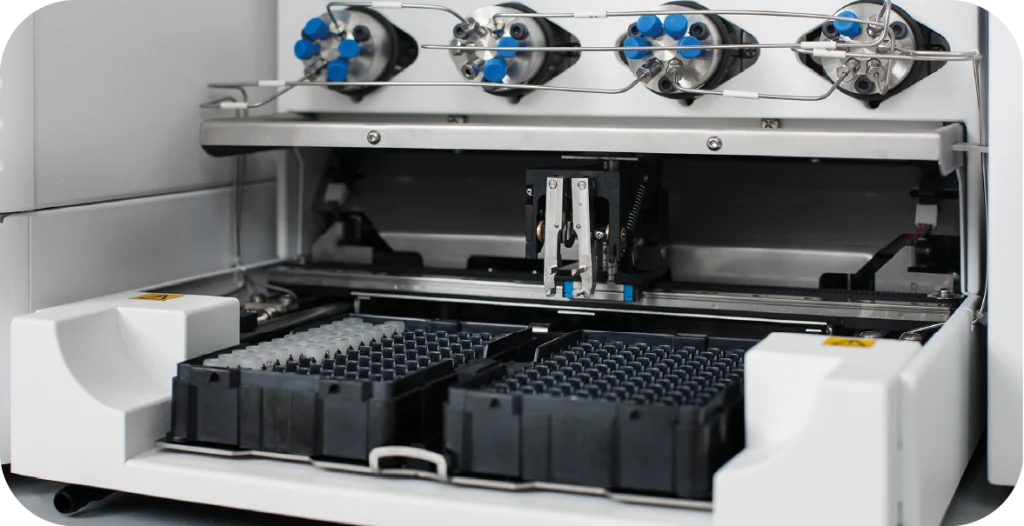 The internals of the CHRONECT Symbiosis RIDA®CREST, containing trays, buttons and knobs